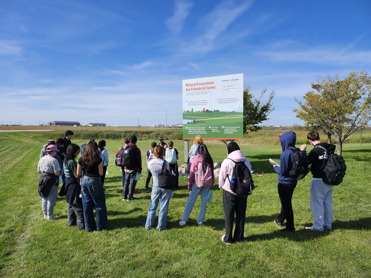 Students on a field trip learning about natural ecosystems on farms